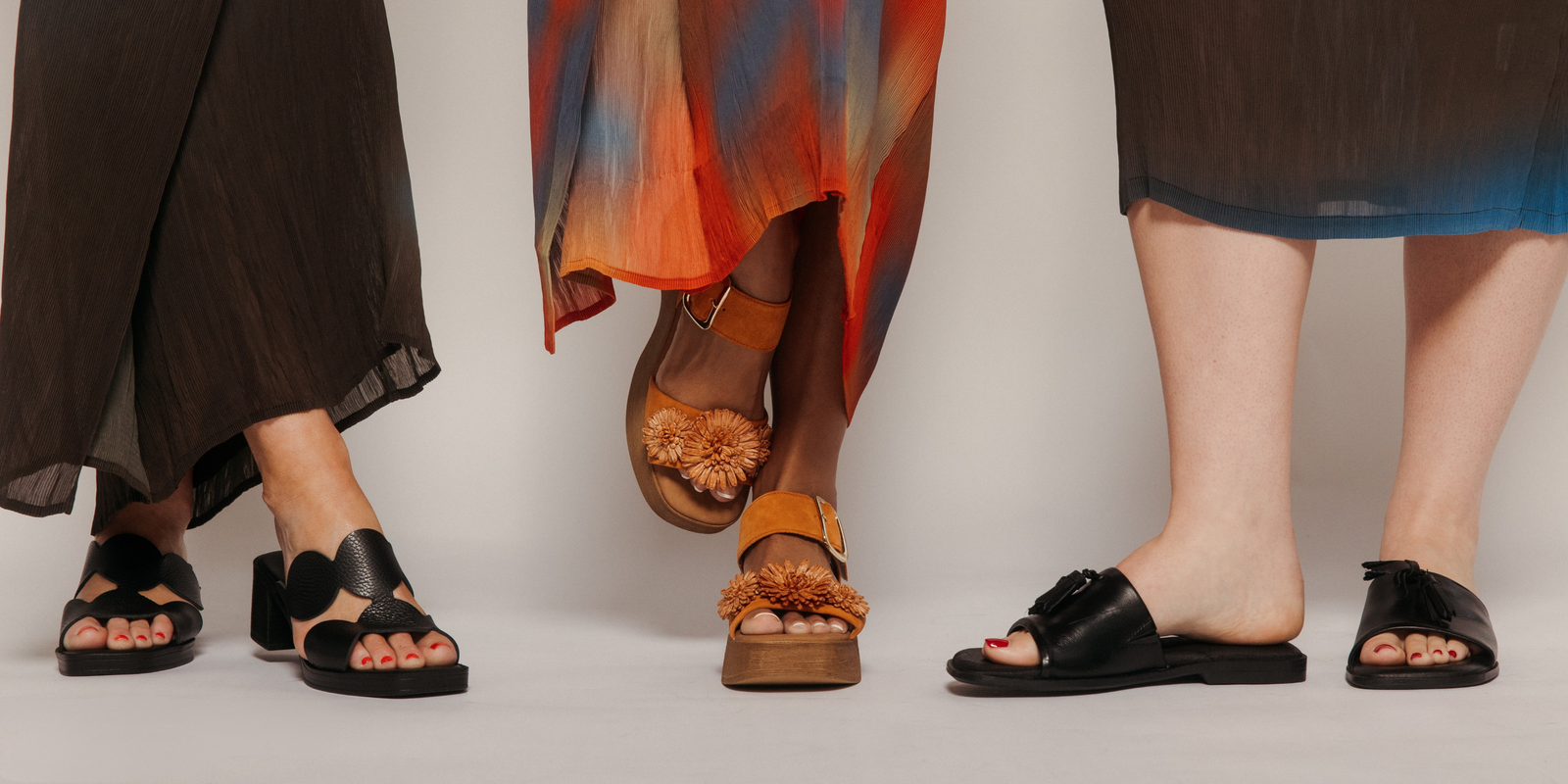 Three pairs of summer sandals on models