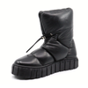 Women's victor black puffer style slip on boot by Atelier